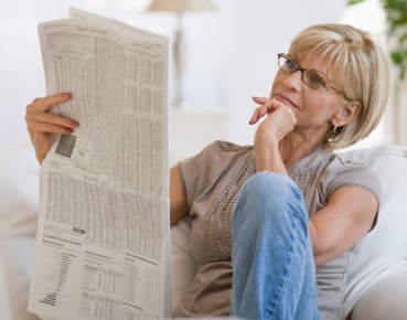 High Quality Lady reading newspaper Blank Meme Template