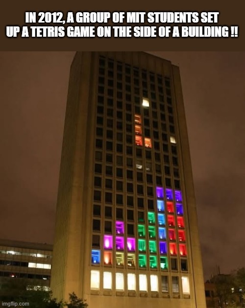 In 2012, a group of MIT students set up a game of Tetris on the side of a building !! | IN 2012, A GROUP OF MIT STUDENTS SET UP A TETRIS GAME ON THE SIDE OF A BUILDING !! | image tagged in gaming,tetris,games,video games,computer games,online games | made w/ Imgflip meme maker