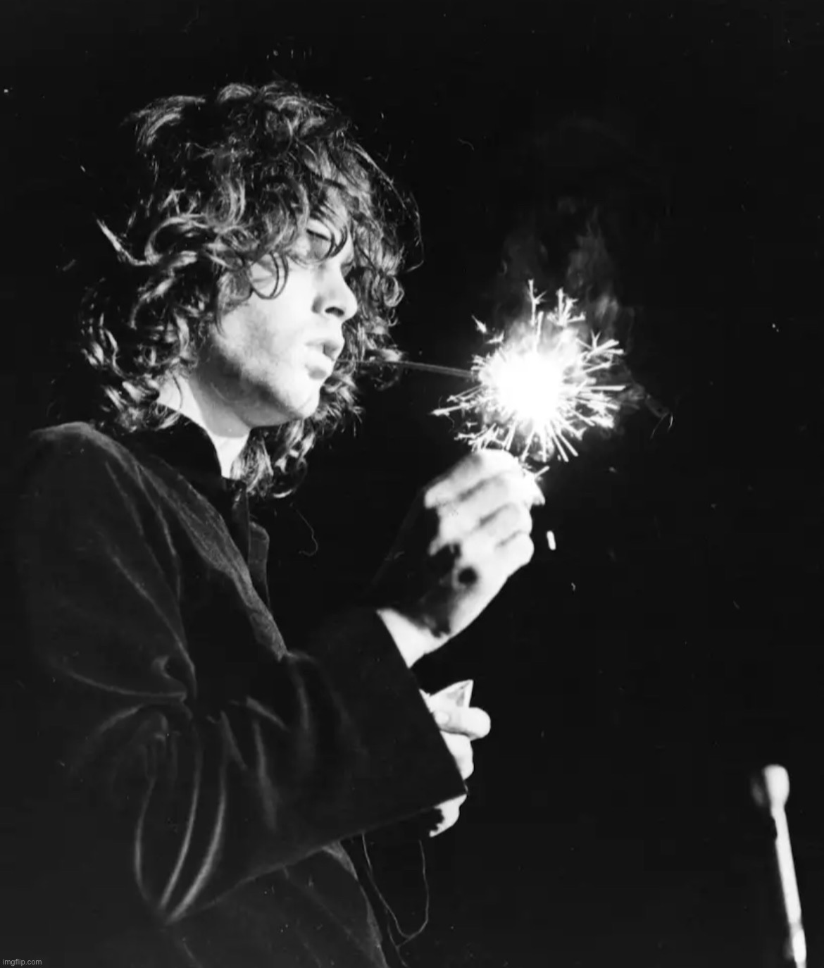 in honor of the 4th of July here’s an image of Jim Morrison lighting a firework | made w/ Imgflip meme maker