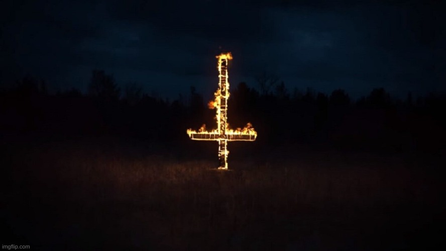 Burning upside-down cross | image tagged in burning upside-down cross | made w/ Imgflip meme maker