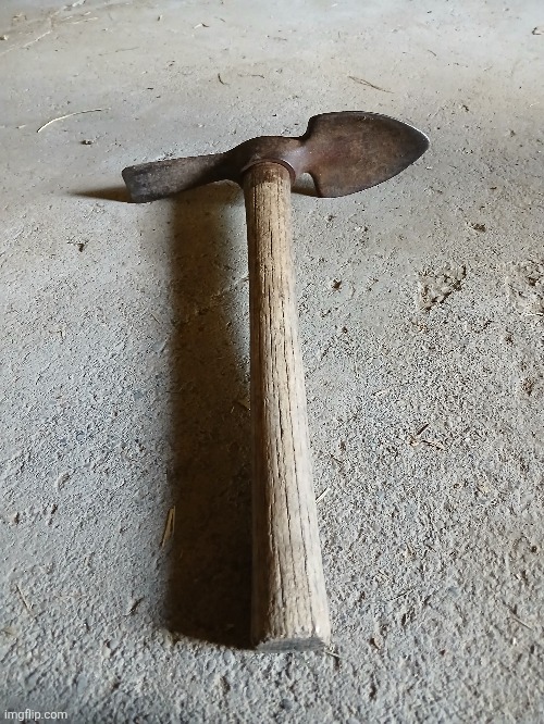 Is this a normal thing to find in your shed (ww1 trench pickaxe btw) | image tagged in ww1 | made w/ Imgflip meme maker