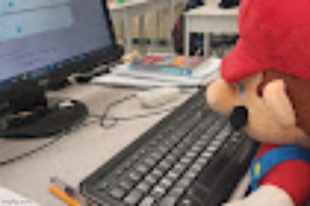 Mario on computer | image tagged in mario on computer | made w/ Imgflip meme maker