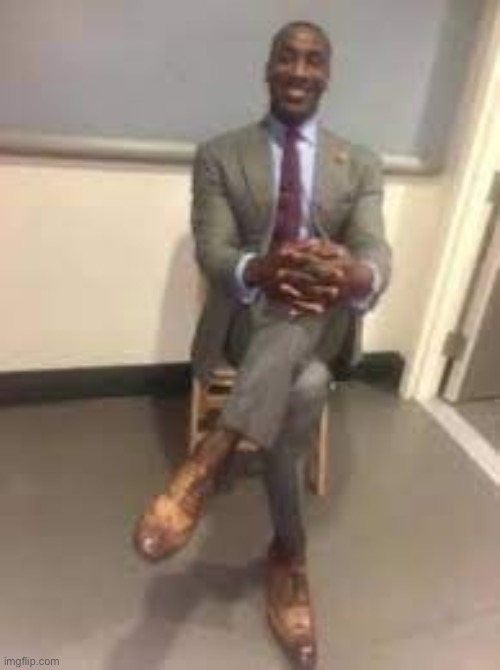 a man in a suit | image tagged in a man in a suit | made w/ Imgflip meme maker