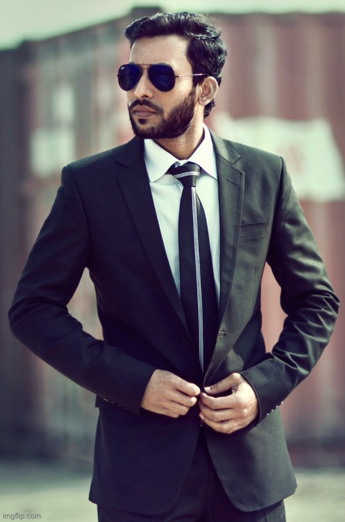 Man in a suit | image tagged in man in a suit | made w/ Imgflip meme maker