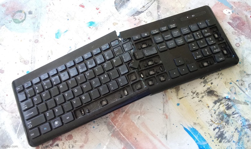 Smashed Keyboard | image tagged in smashed keyboard | made w/ Imgflip meme maker
