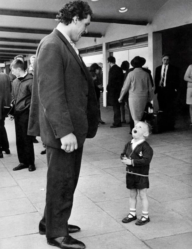 Andre the Giant meets kid Blank Meme Template
