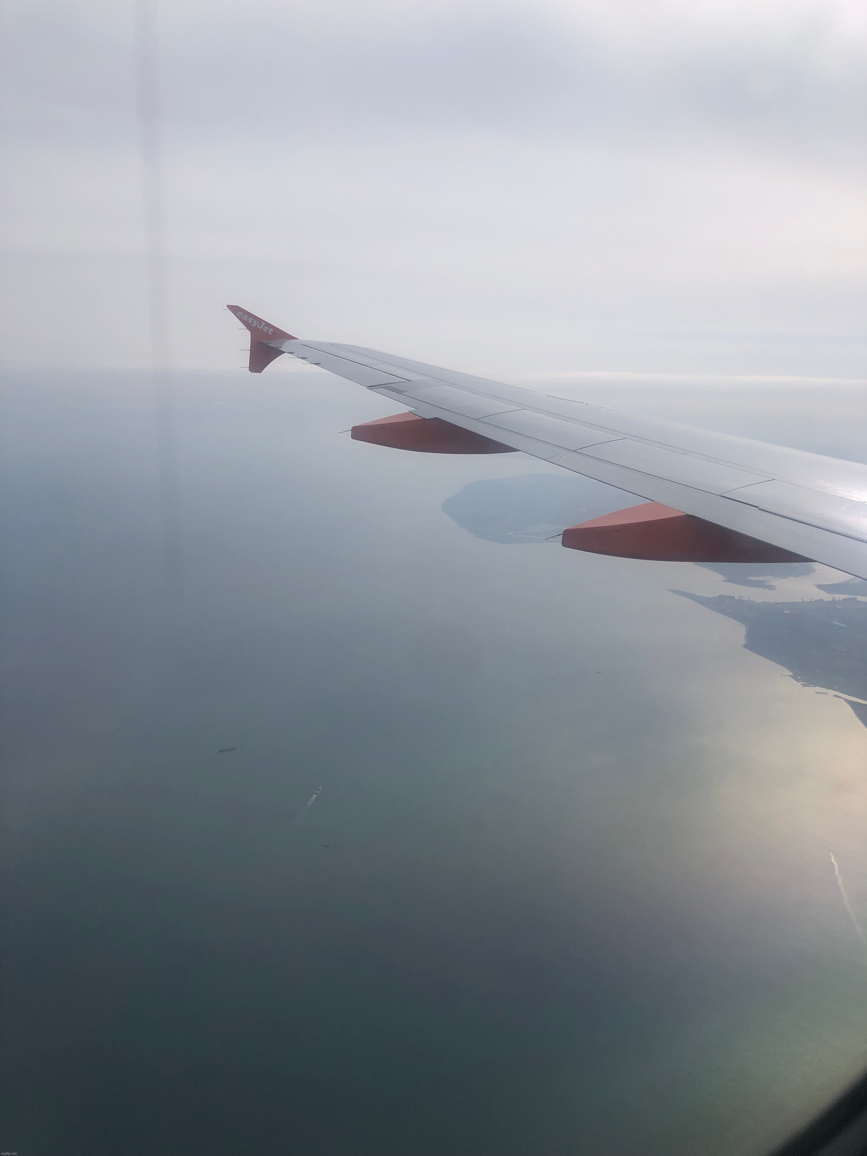 Photo I took entering the uk (on the same flight btw) | made w/ Imgflip meme maker