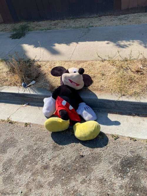 The Face lore | image tagged in abandoned mickey | made w/ Imgflip meme maker