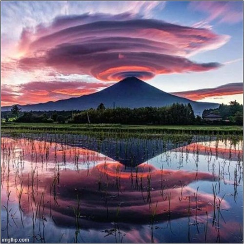 A View Of Mt Fuji Surmounted By Lenticular Clouds Relected In A Lake | image tagged in mount fuji,lenticular,clouds | made w/ Imgflip meme maker