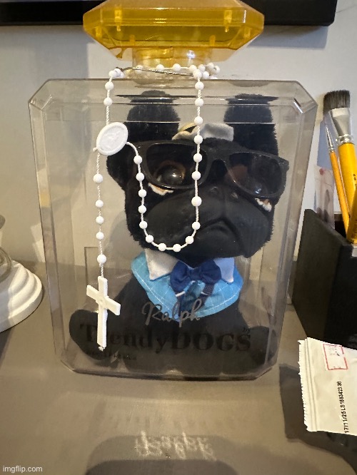 This is ralph, he is a demon from Hell, that is Why he is stuck there, With a cross | made w/ Imgflip meme maker