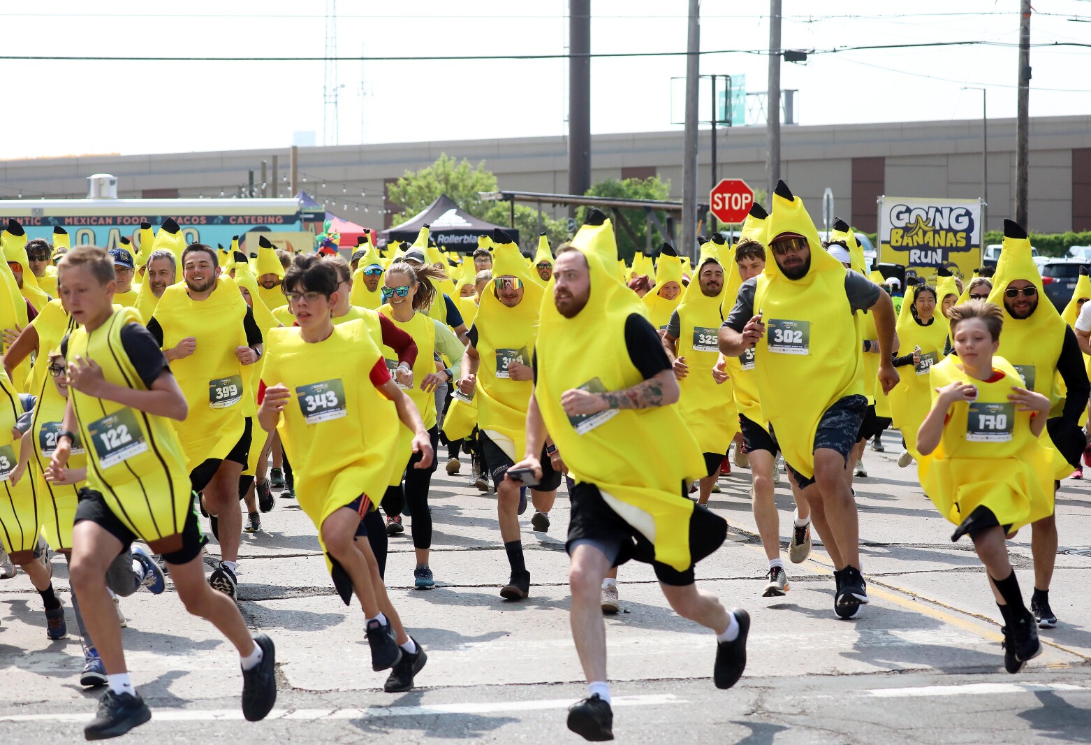 crowd of people wearing yellow Blank Meme Template
