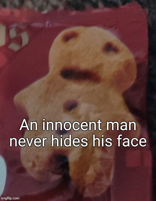 Cookie | An innocent man never hides his face | image tagged in cookie | made w/ Imgflip meme maker