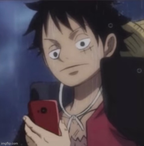 Luffy looking at his phone | image tagged in luffy looking at his phone | made w/ Imgflip meme maker