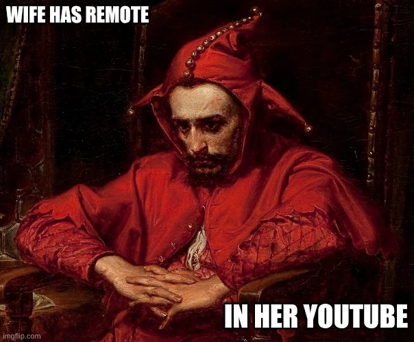 Wife with Remote | WIFE HAS REMOTE; IN HER YOUTUBE | image tagged in waiting,despair | made w/ Imgflip meme maker
