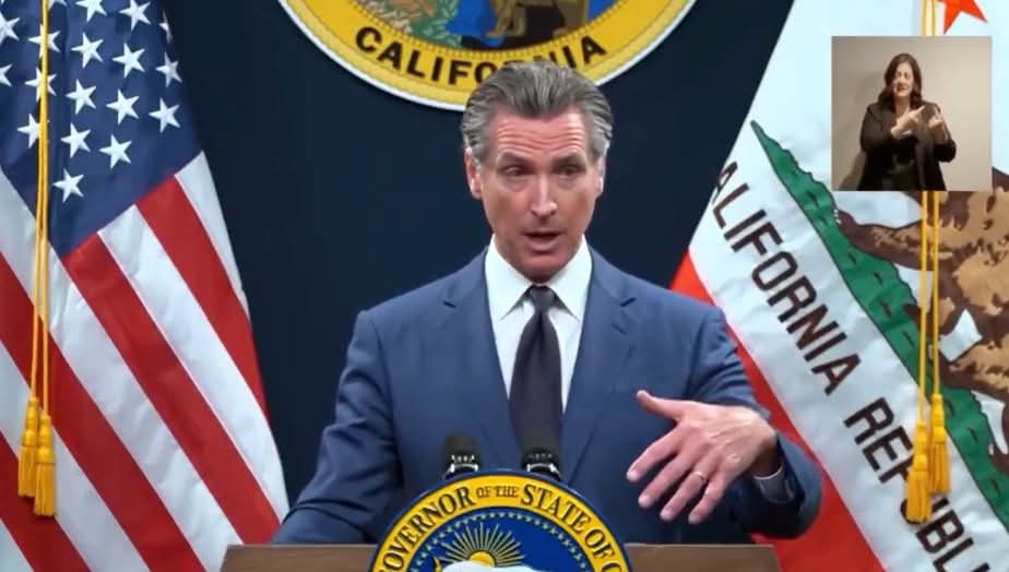 Gavin Newsom at podium Blank Meme Template