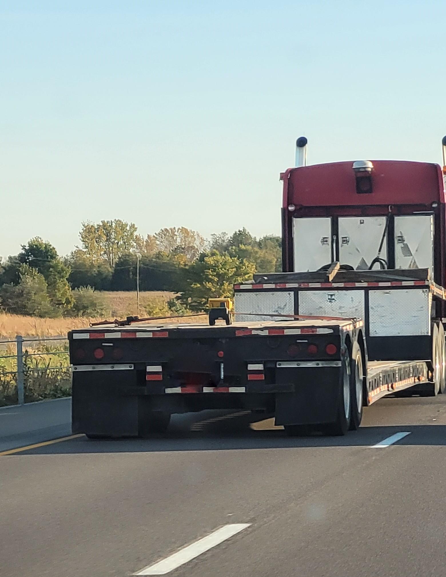 Toy truck on a Tractor Trailer Blank Meme Template