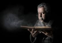 Old man blowing dusty book Blank Meme Template