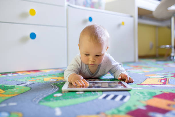 Kid playing tablet Blank Meme Template