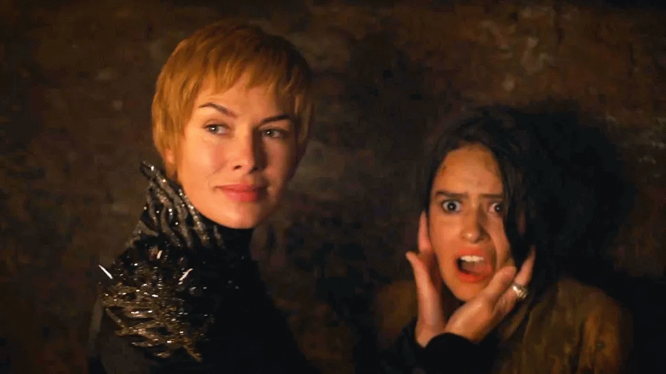 Cersei holding Ellaria's face as she watches her daughter Tyene Blank Meme Template