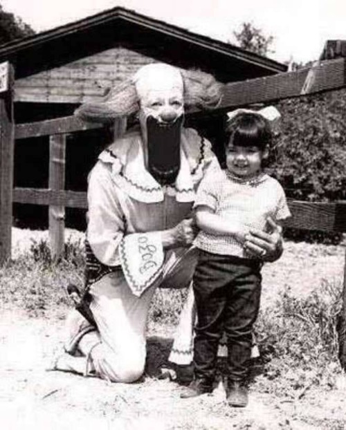 Paranormal Clown | image tagged in creepy clowns,demonic,child,black and white,cursed images,creepy | made w/ Imgflip meme maker