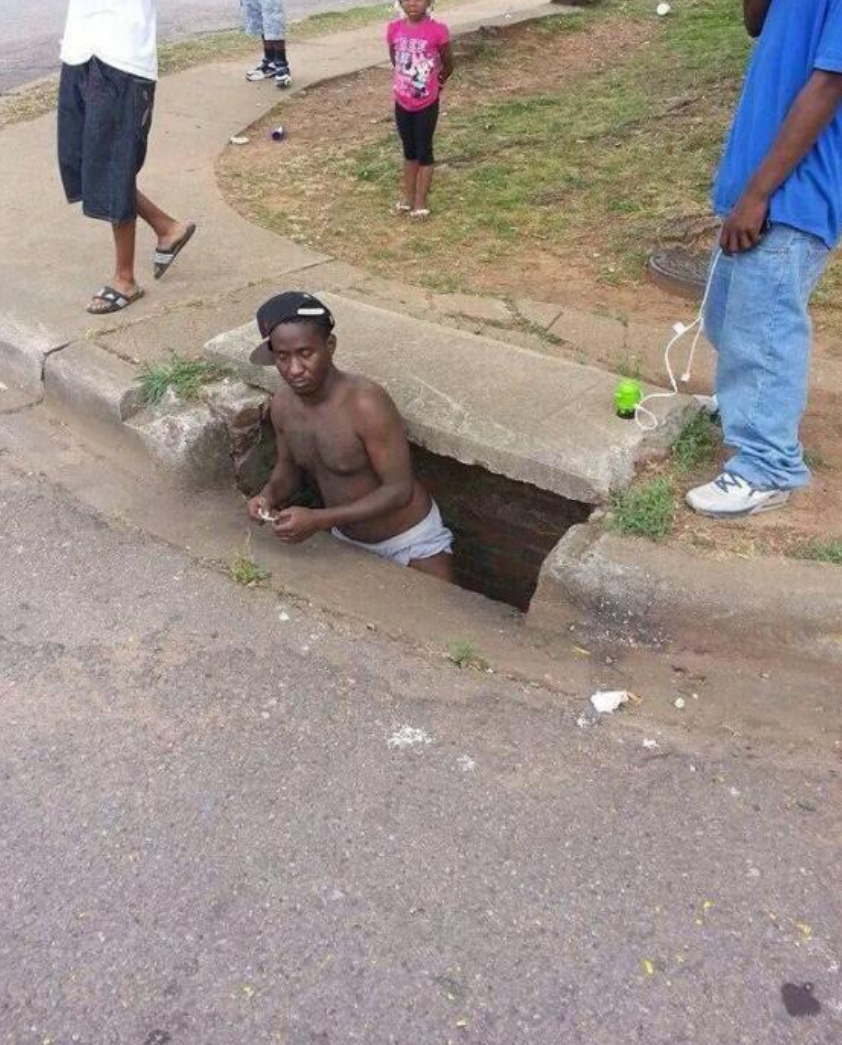 Guy coming out of sewer Blank Meme Template