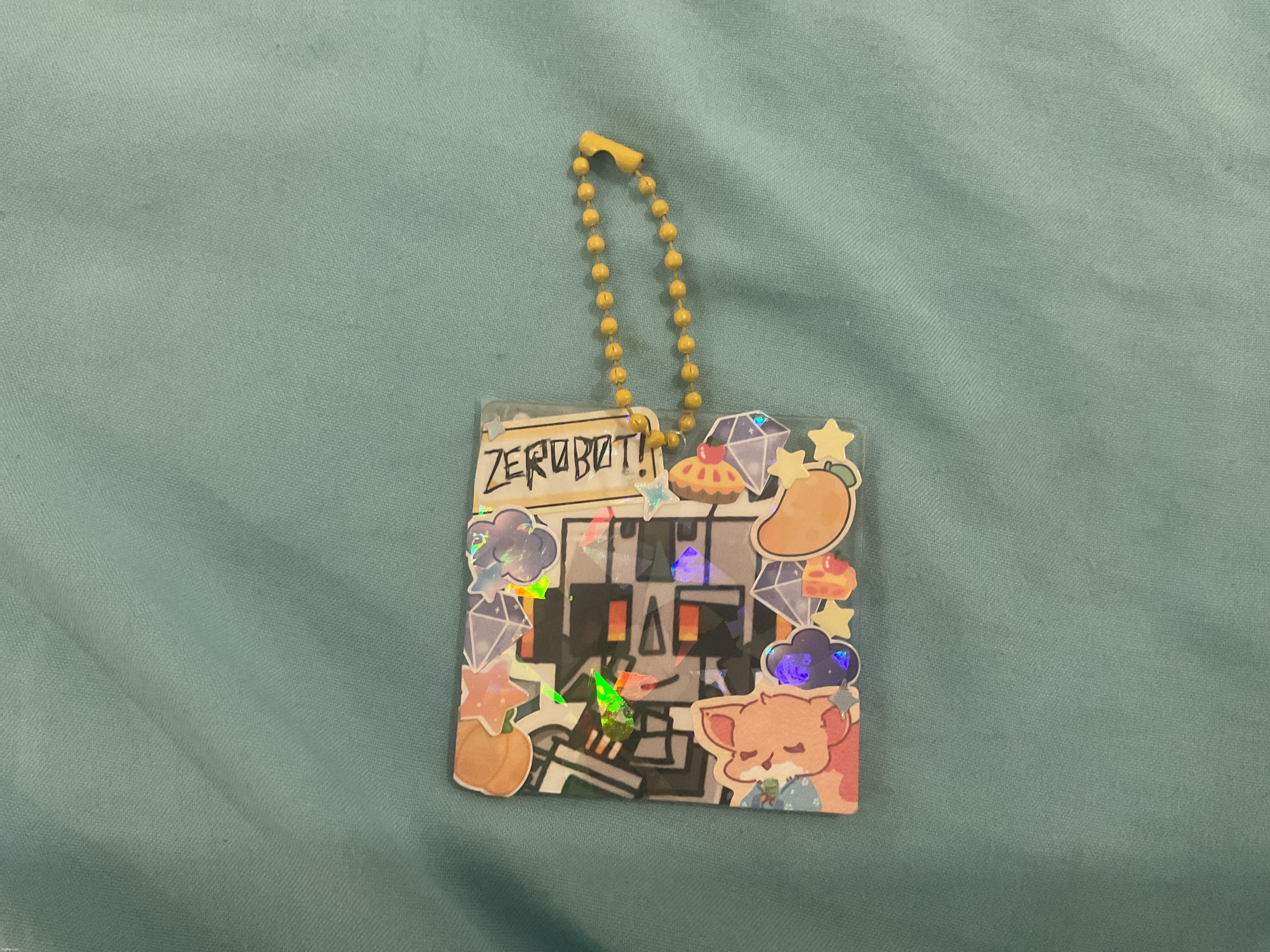 y’all should make merch of your ocs | image tagged in keychain,zerobot,oc | made w/ Imgflip meme maker