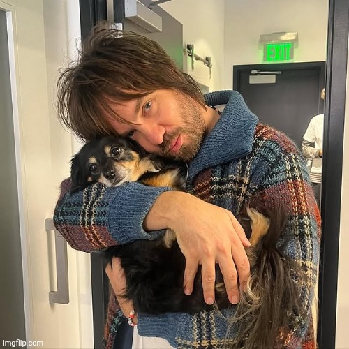 two cuties (new yapping temp) | image tagged in kevin parker hugging puppy | made w/ Imgflip meme maker