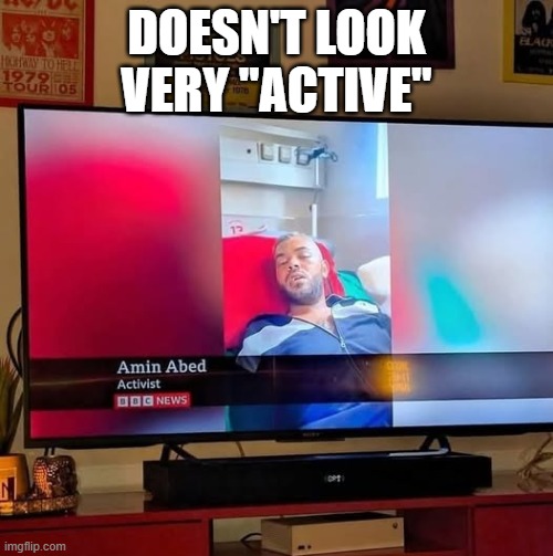 Activist | DOESN'T LOOK VERY "ACTIVE" | image tagged in funny,memes | made w/ Imgflip meme maker