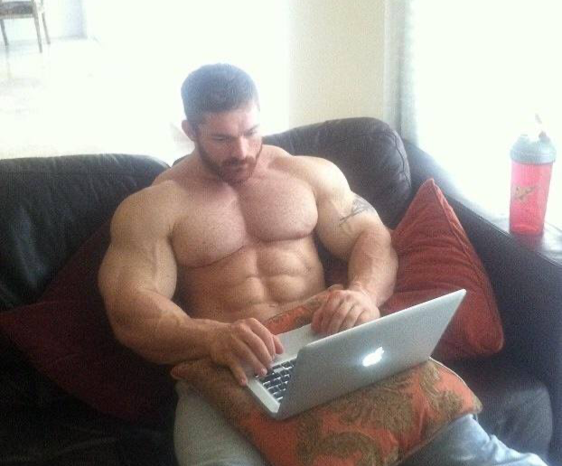 Buff dude using laptop Blank Meme Template
