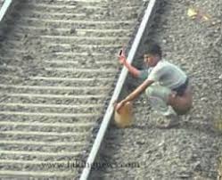 Indian man pooping on railway track Blank Meme Template