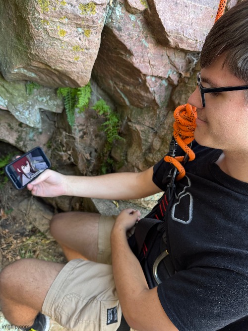 Watching Steins;Gate on the side of a cliff | made w/ Imgflip meme maker