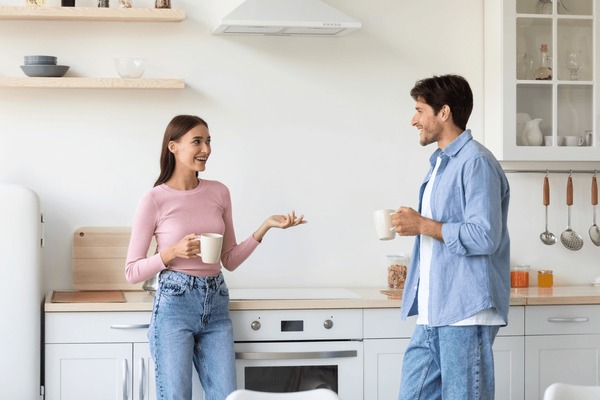 Couple talking in kitchen Blank Meme Template