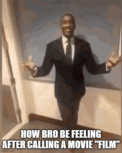 Mr fancy pants | HOW BRO BE FEELING AFTER CALLING A MOVIE "FILM" | image tagged in smiling black guy in suit | made w/ Imgflip meme maker