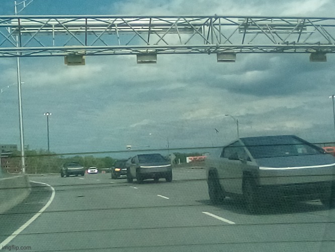 3 cybertrucks in a row (taken in Montreal on May 17, 2025) | image tagged in cybertruck,memes,montreal,funny,carspotting,quebec | made w/ Imgflip meme maker