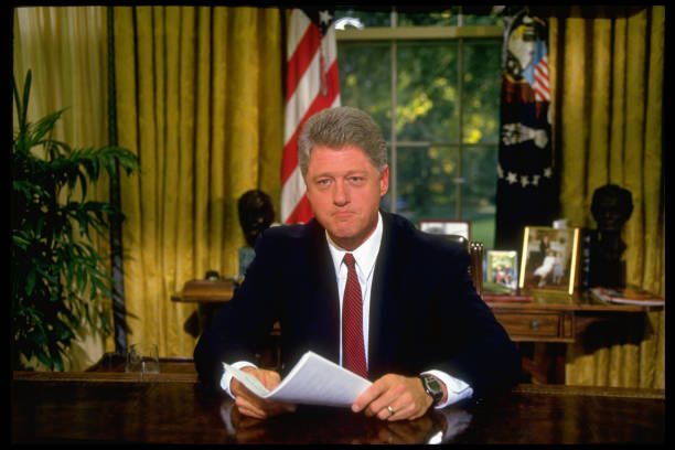 Bill Clinton behind Oval Office desk Blank Meme Template