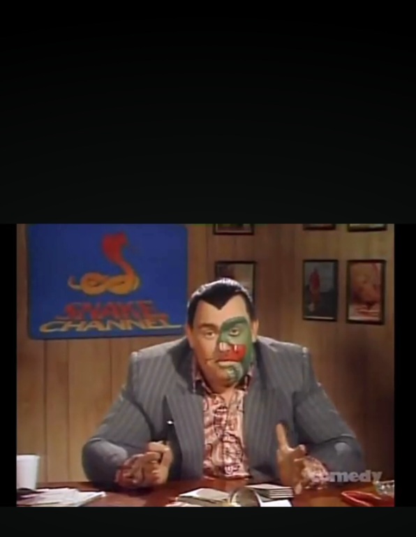 John Candy as Harry's Sex Shop manager Blank Meme Template