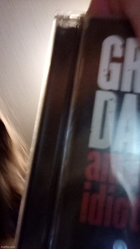 I was trying to show off my American idiot green day cd but the photo ended like this </3 | made w/ Imgflip meme maker