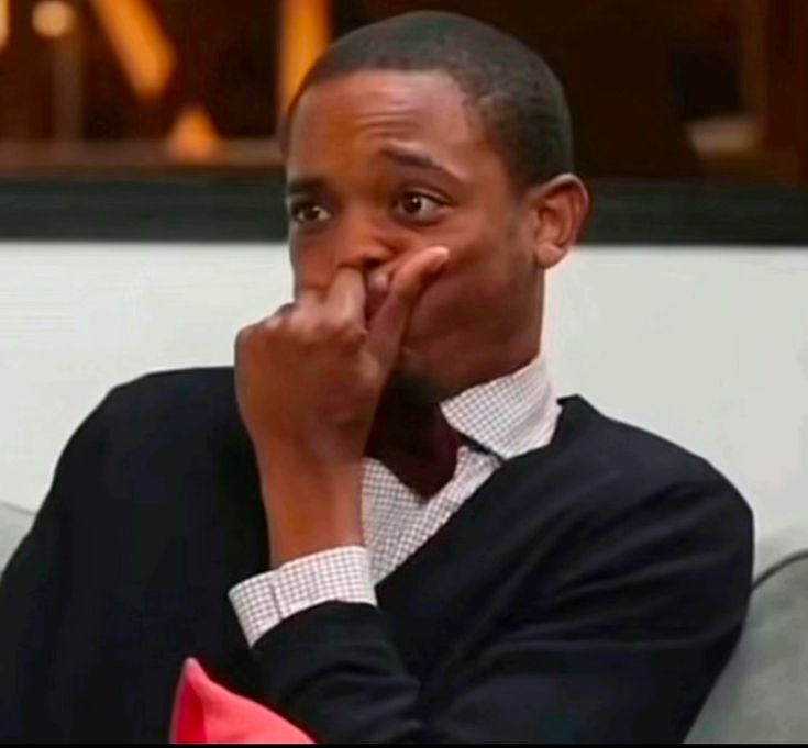 man holding his laugh Blank Meme Template