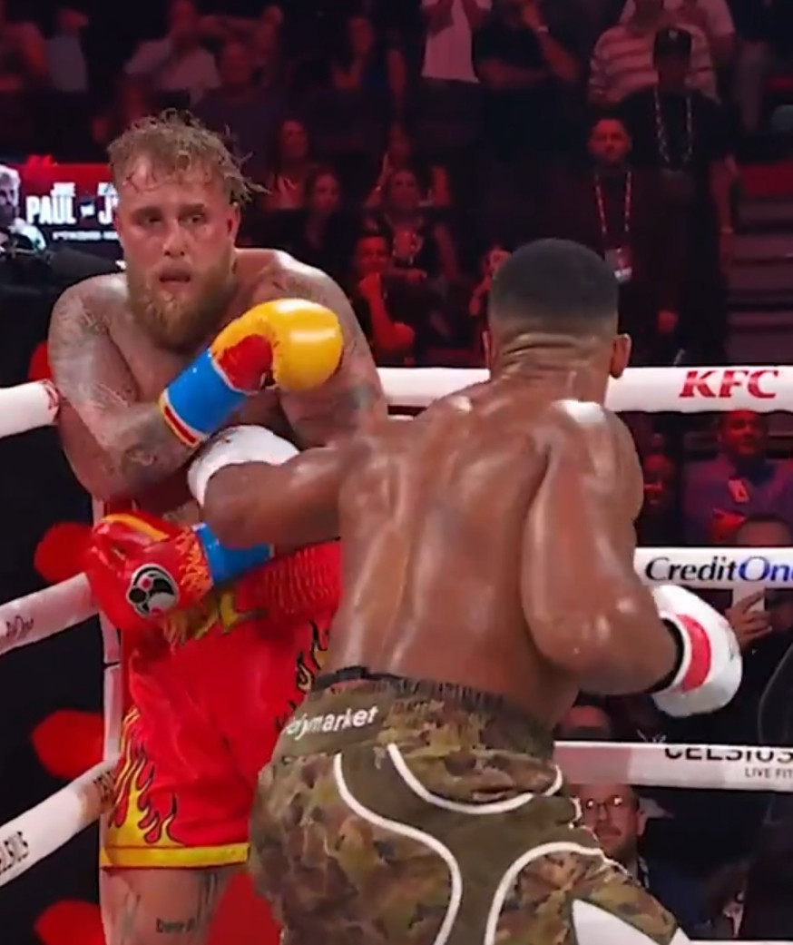 Jake Paul getting beat up by Anthony Joshua Blank Meme Template