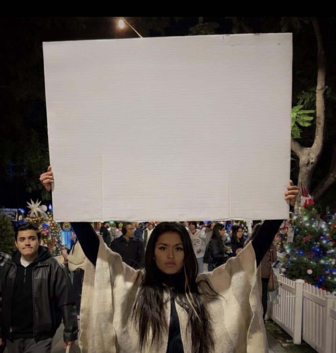 Holding a sign Blank Meme Template