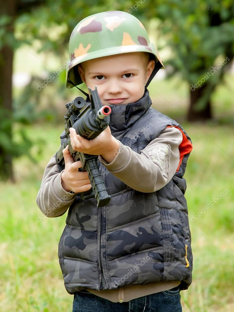 boy child with toy gun Arbie JPP Blank Meme Template