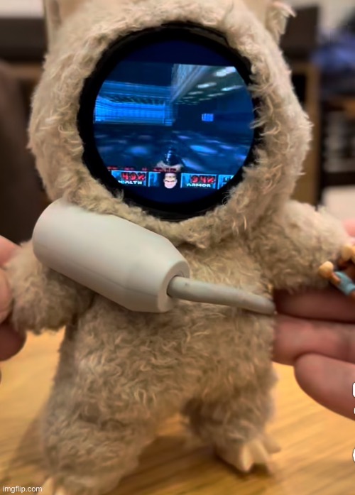 second day of 2026 and I see someone running Doom on a labubu | made w/ Imgflip meme maker