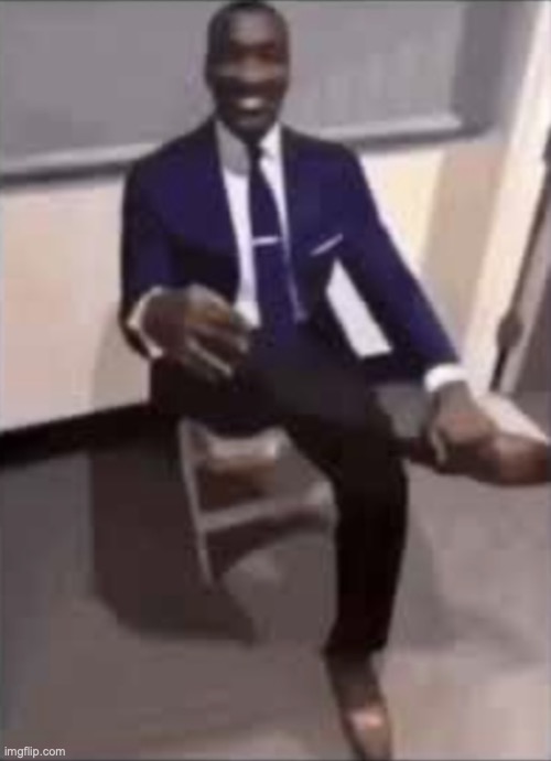 Black man in a suit | image tagged in black man in a suit | made w/ Imgflip meme maker