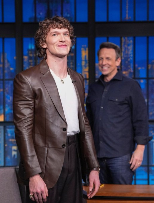 Seth Meyers smiling at Connor Storrie Blank Meme Template