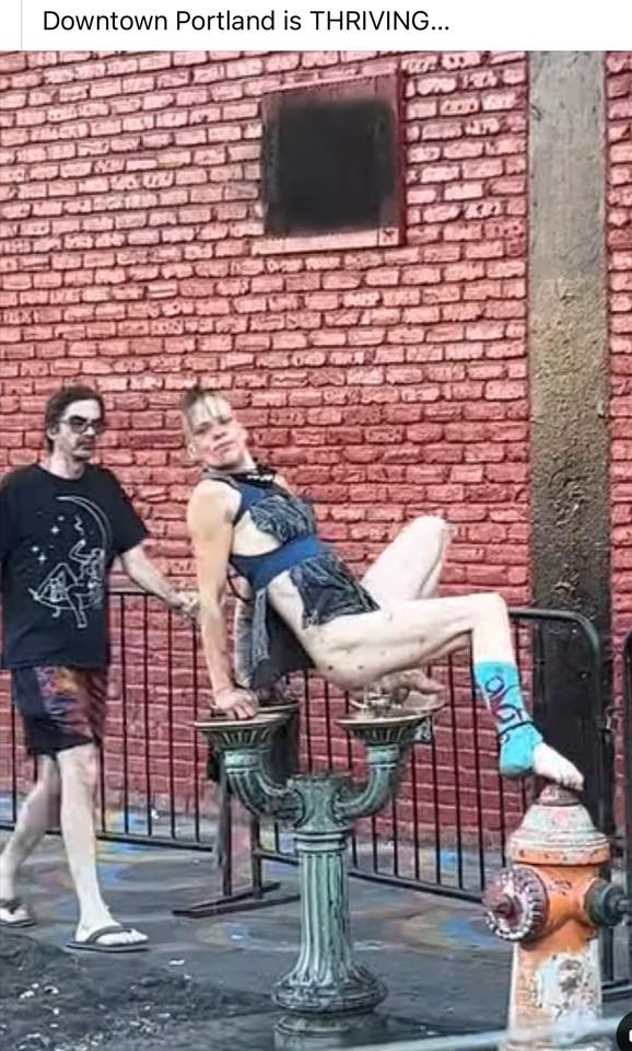 homeless drug addict douching his ass in Portland Benson Bubbler Blank Meme Template