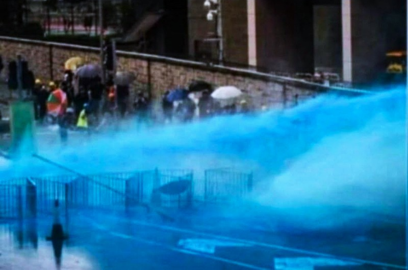 Japan sprays looters and rioters with blue dye Blank Meme Template