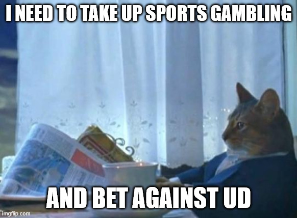 Cat newspaper | I NEED TO TAKE UP SPORTS GAMBLING; AND BET AGAINST UD | image tagged in cat newspaper | made w/ Imgflip meme maker