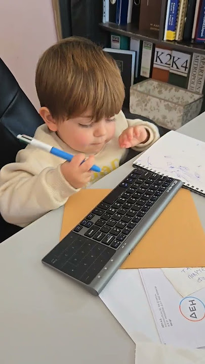 child baby genius computer keyboard work pen writing Blank Meme Template
