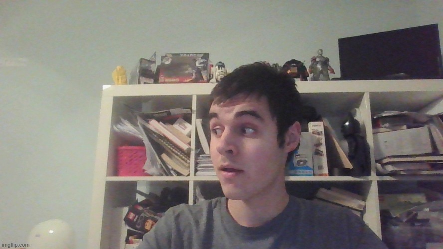 Calmly Watching Chaos” | image tagged in suspicious | made w/ Imgflip meme maker