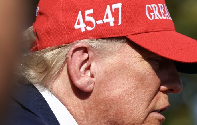 Donald Trump ear a year after it was "shot" off Blank Meme Template